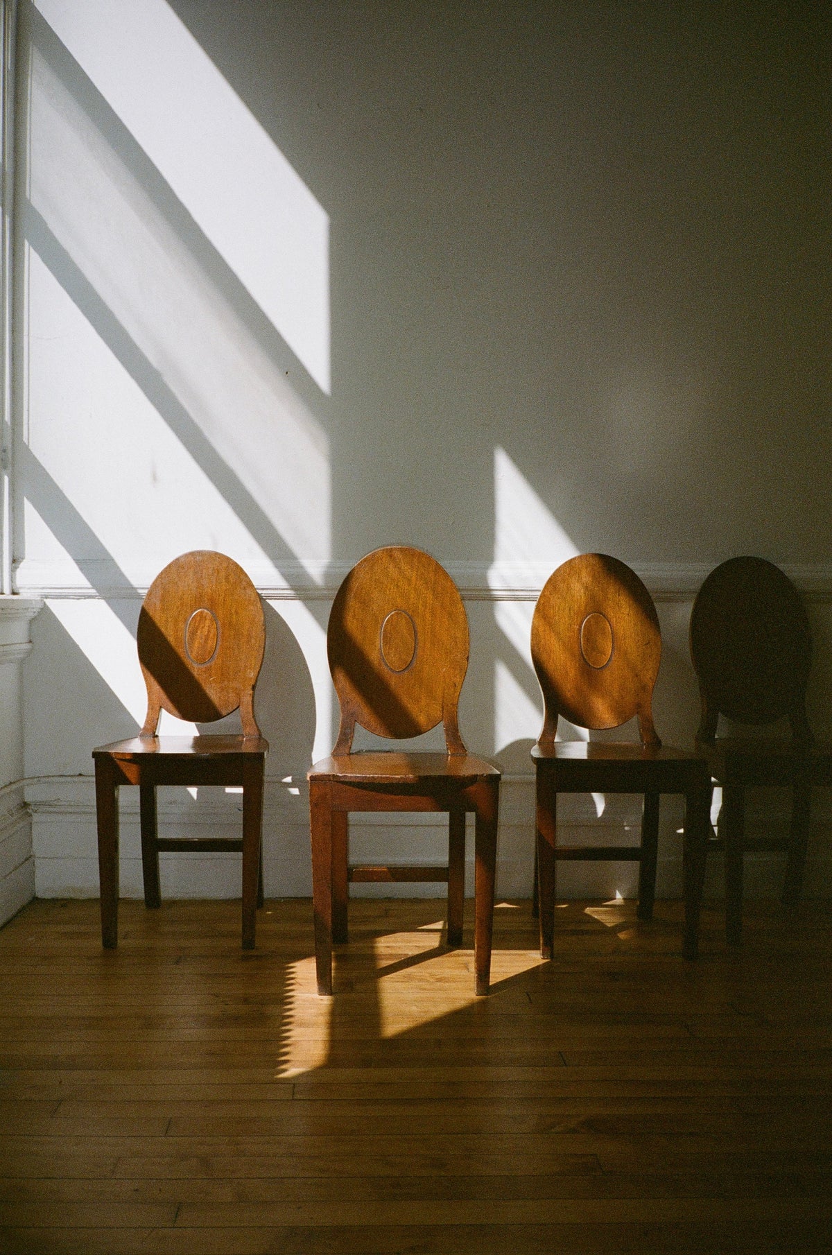 Set of Four George III Mahogany Hall Chairs, Circa 1780